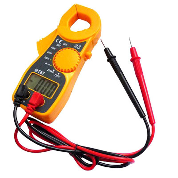Technician checking a clamp meter during inspection service